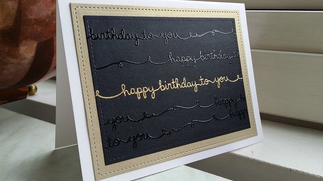 I made a very clean and simle birthdaycard! Embossed the text whith clear and gold.